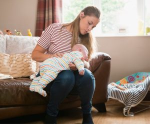 Burping baby - lying on laps