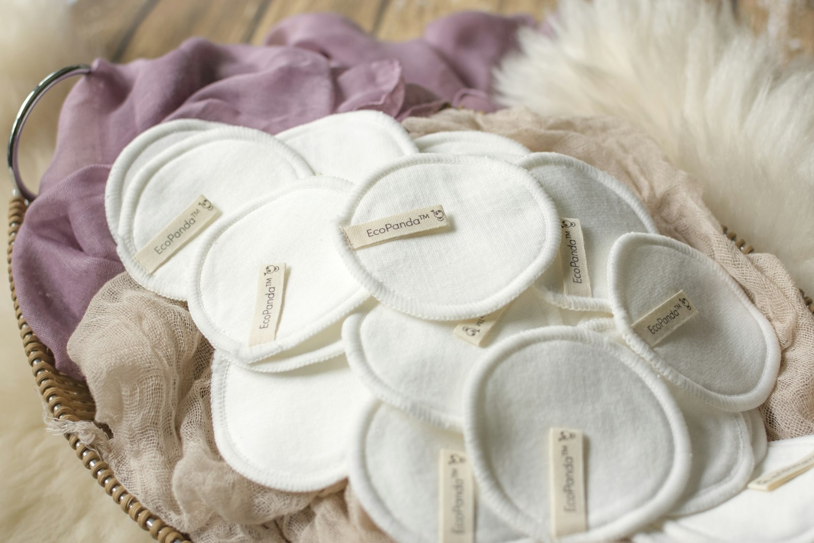 Reusable round cotton pads on a purple cloth