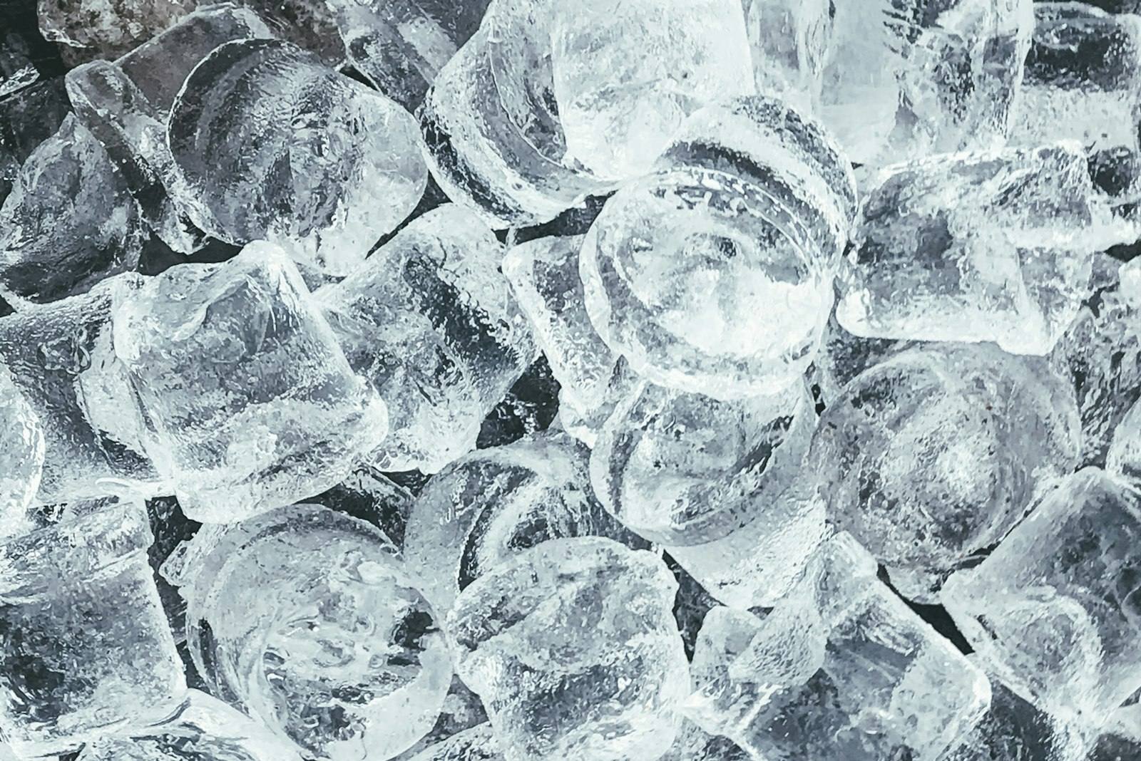 Clear ice cubes catching the light